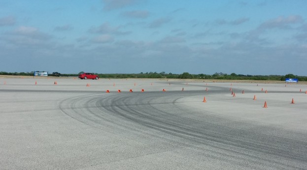 Me making a run in the BMW 3 Series with Pirelli Cinturato P7 tires.  Notice the cones just ahead that are knocked over...