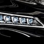 2015 tlx exterior in crystal black pearl headlight cluster