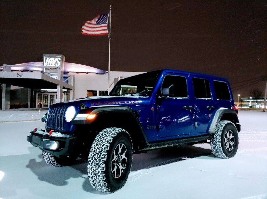 Our 2020 Jeep Wrangler Unlimited Rubicon press vehicle. The first night we had it, a snowstorm blanketed the Detroit metro. We didn't get to enjoy the shiny blue paint for long, but we were able to test out the 4x4 system. 