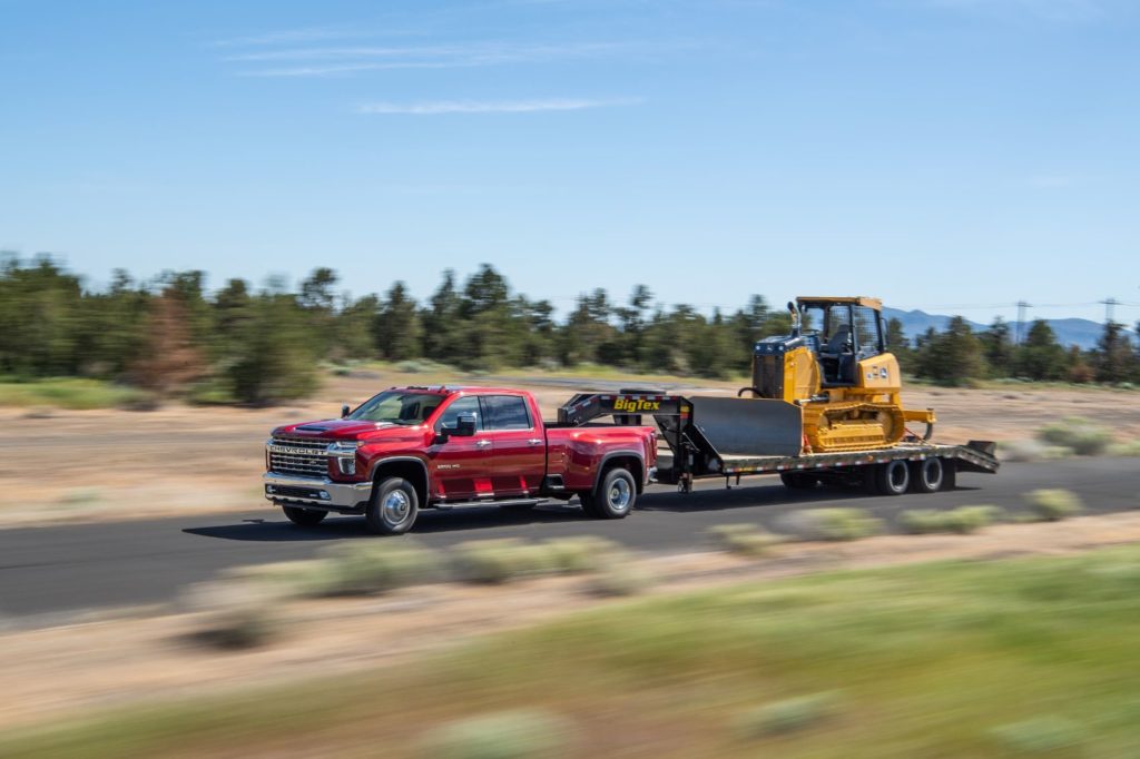 2021 Chevy Silverado HD towing on the open road. 
